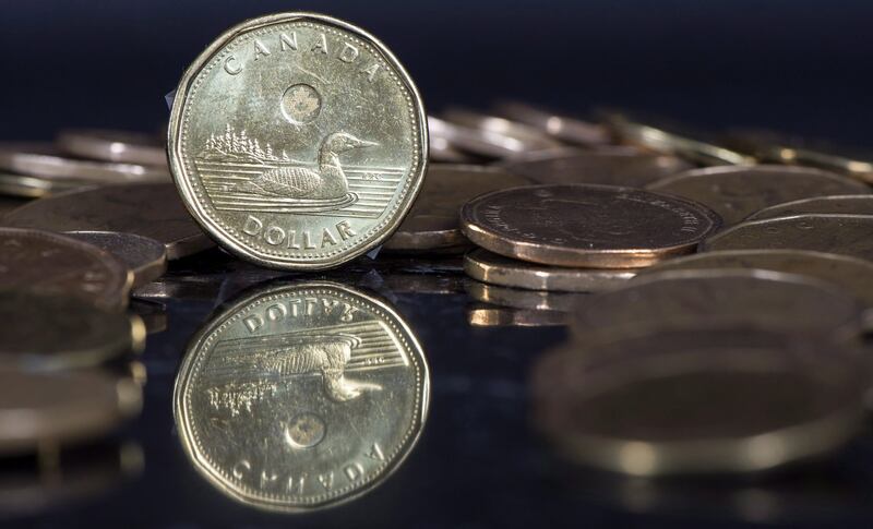 Le dollar canadien s'échangeait mardi à 71,19 cents US, contre 71,43 cents US vendredi. LA PRESSE CANADIENNE/Paul Chiasson